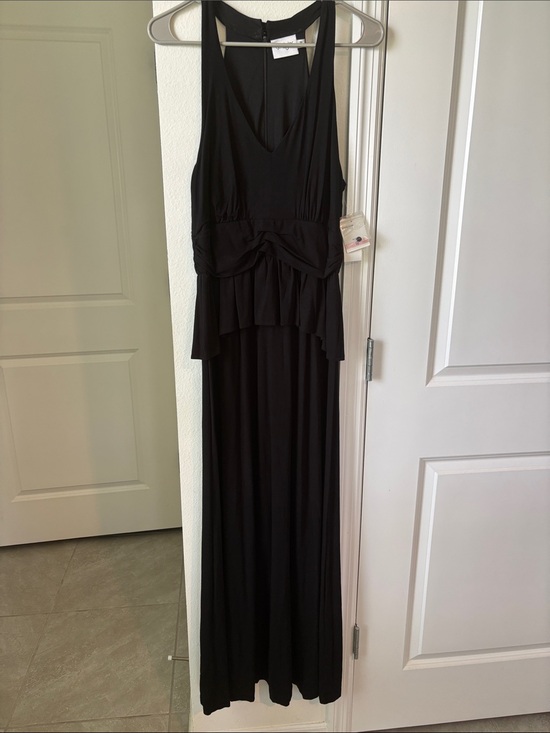 J. Taylor Dresses & Skirts - Sleek Black Sleeveless Maxi Dress with Peplum Detail
